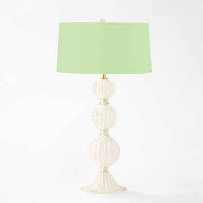 White Murano glass table lamp with light green shade.