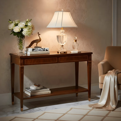 Italian console table with a crystal and antique brass lamp in a luxurious living room.