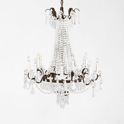 Traditional Italian chandelier with black trim and crystals.