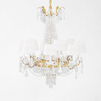 Gold Italian chandelier with white pleated shades and crystals.