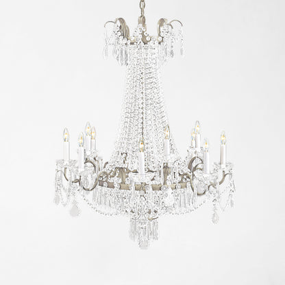 Traditional Italian chandelier with silver trim and crystals.