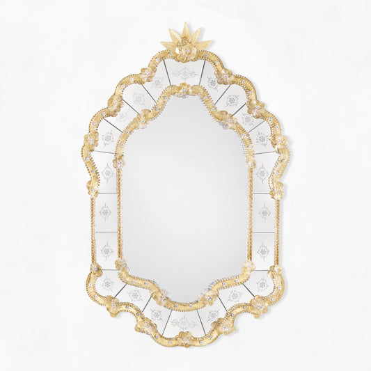 Ornate gold Venetian glass mirror.