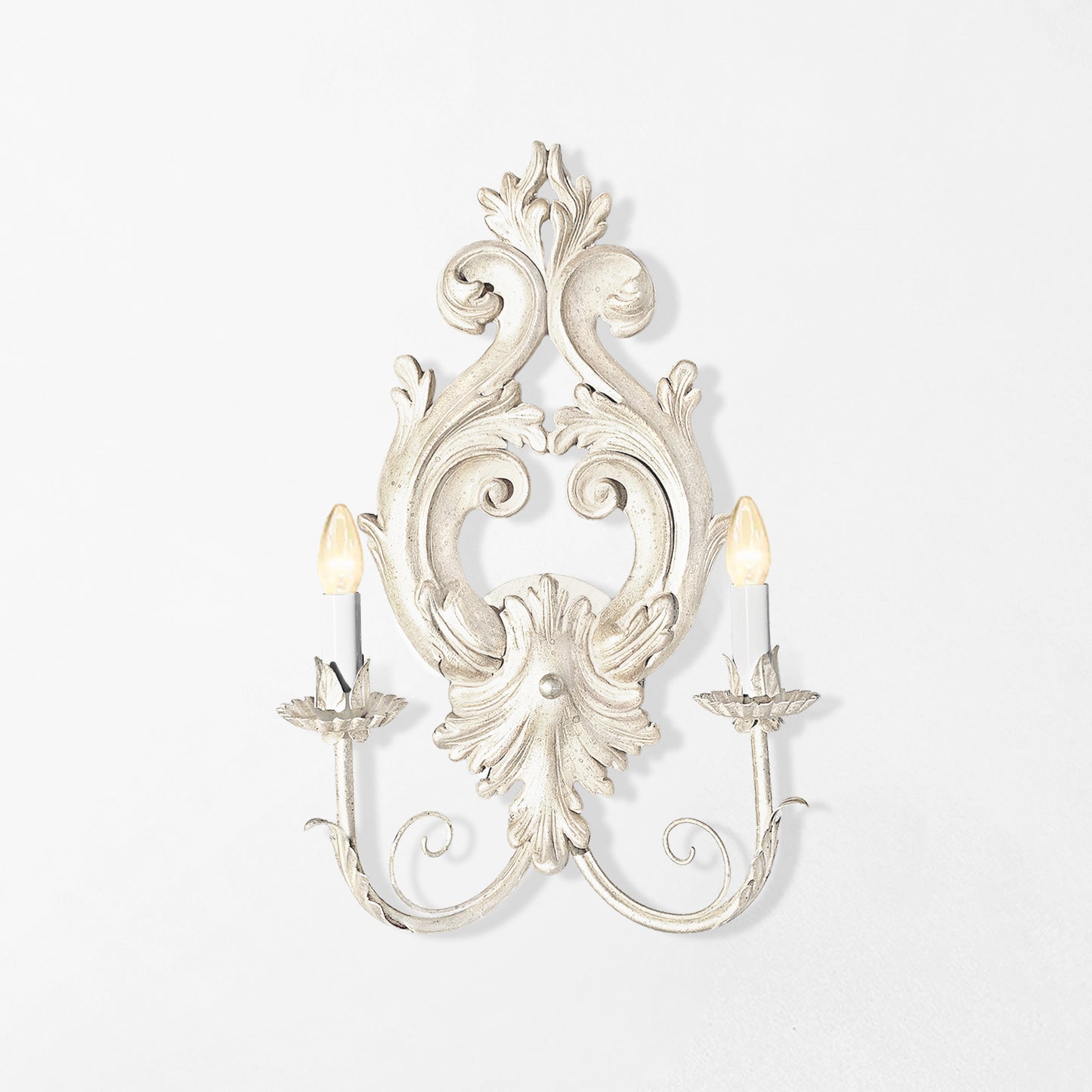 Traditional white wood sconce.