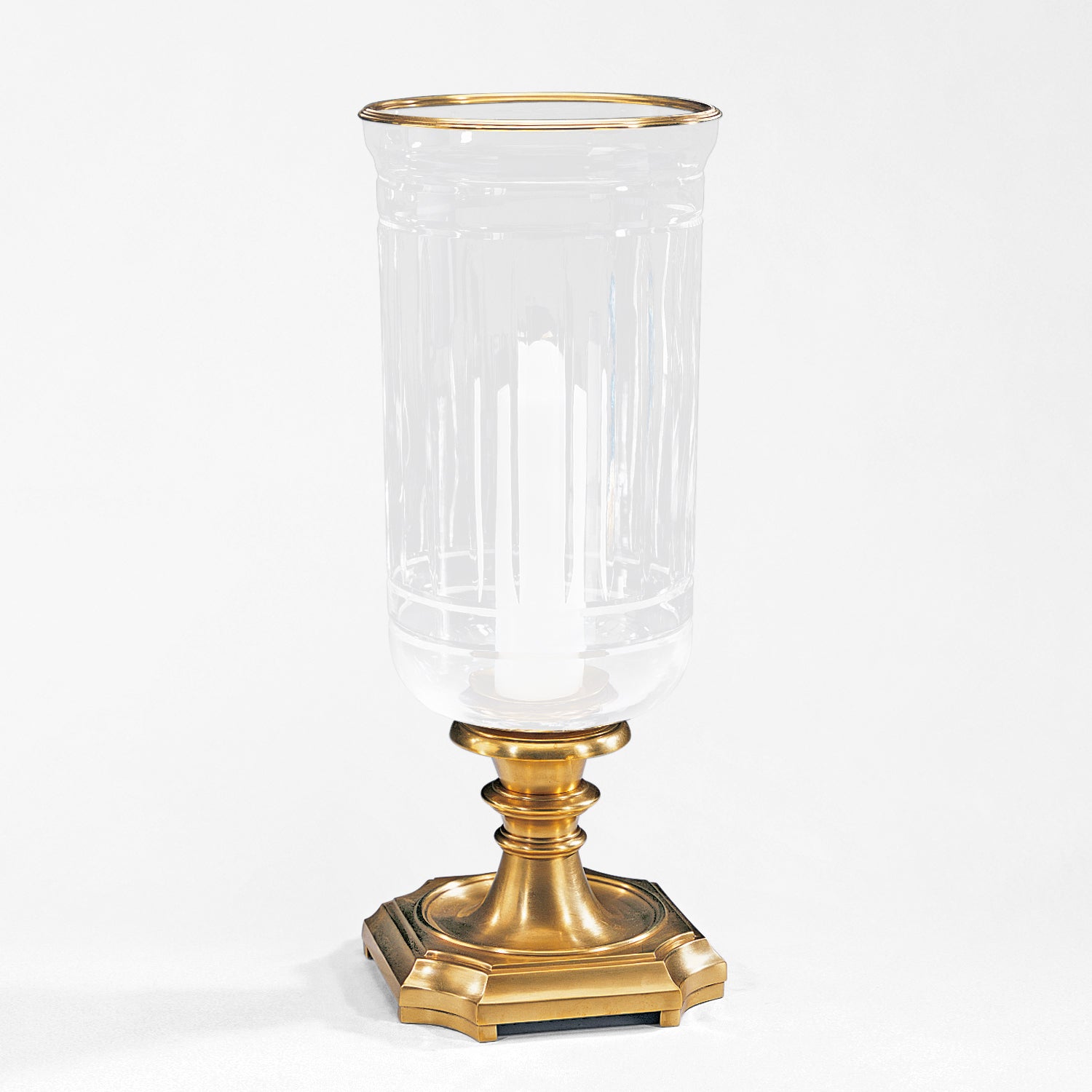 Antique brass hurricane lamp with glass.