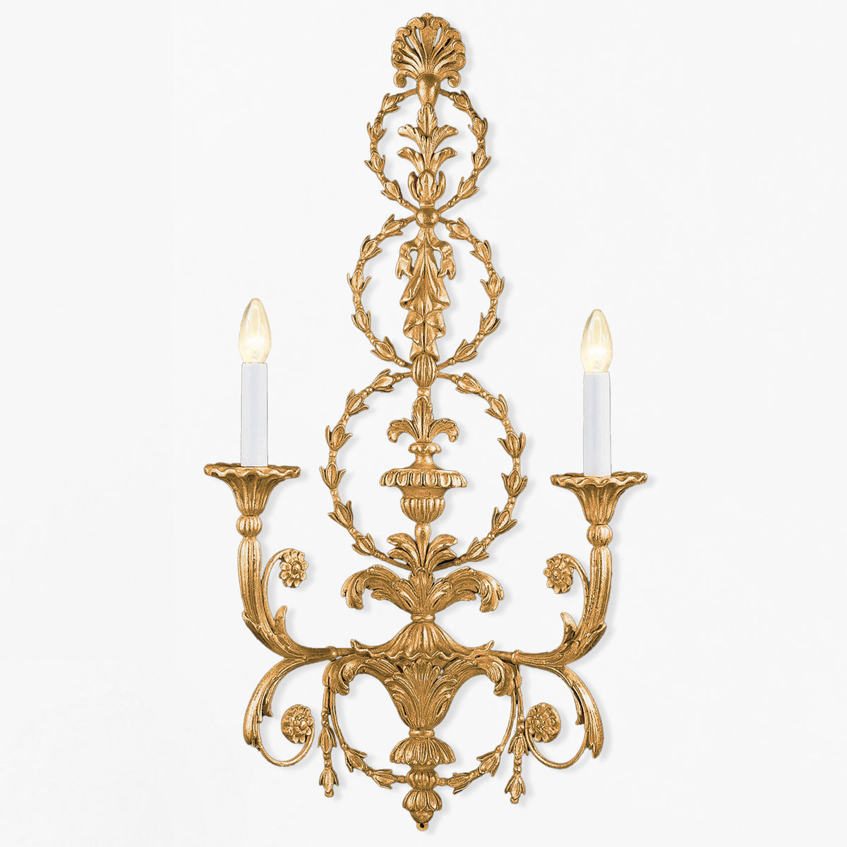 Large gold luxury sconce with ornate carved design.