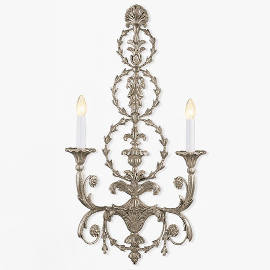 Traditional wood sconce with silver finish.