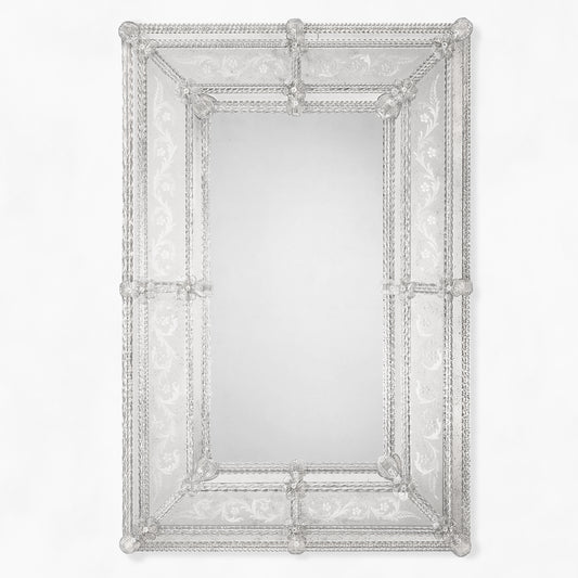 Ornate clear Venetian glass mirror.