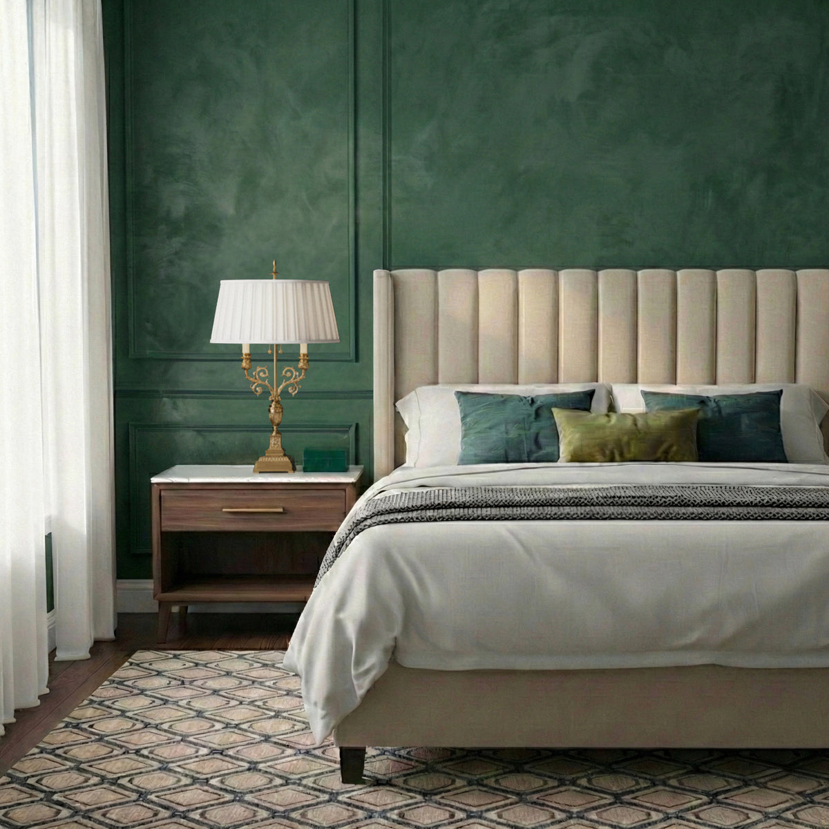 An antique brass table lamp with pleated shade in a luxurious bedroom with green walls.
