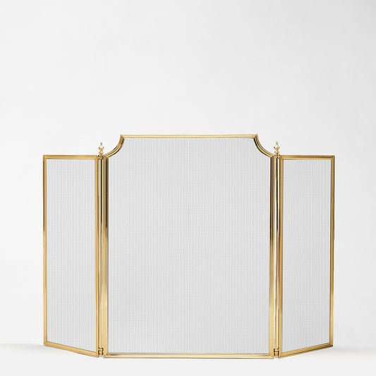 Luxurious brass fireplace screen.