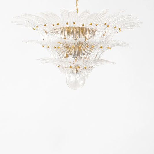 Clear Palm Murano glass chandelier with gold hardware.