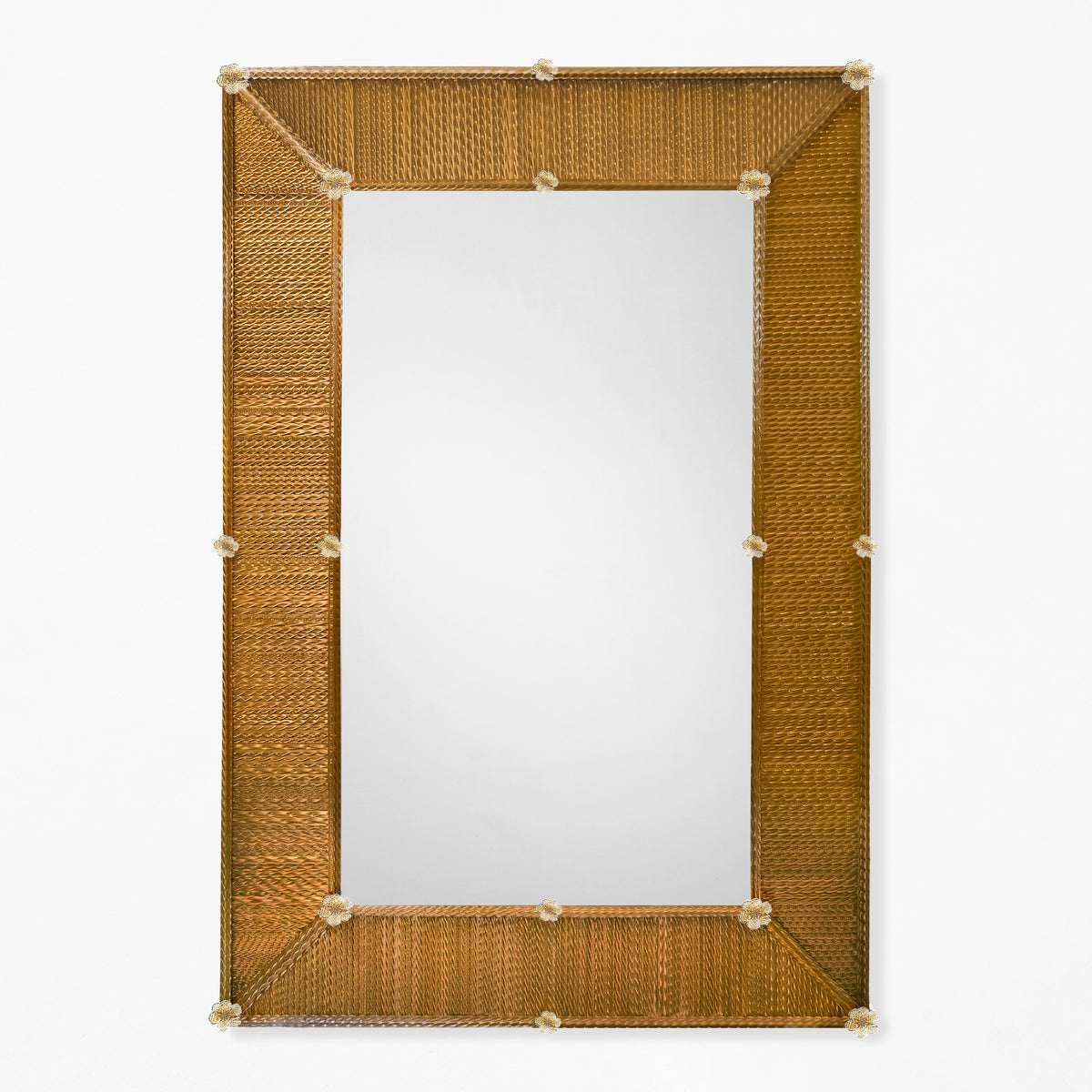 An amber Murano glass mirror with gold rosettes.