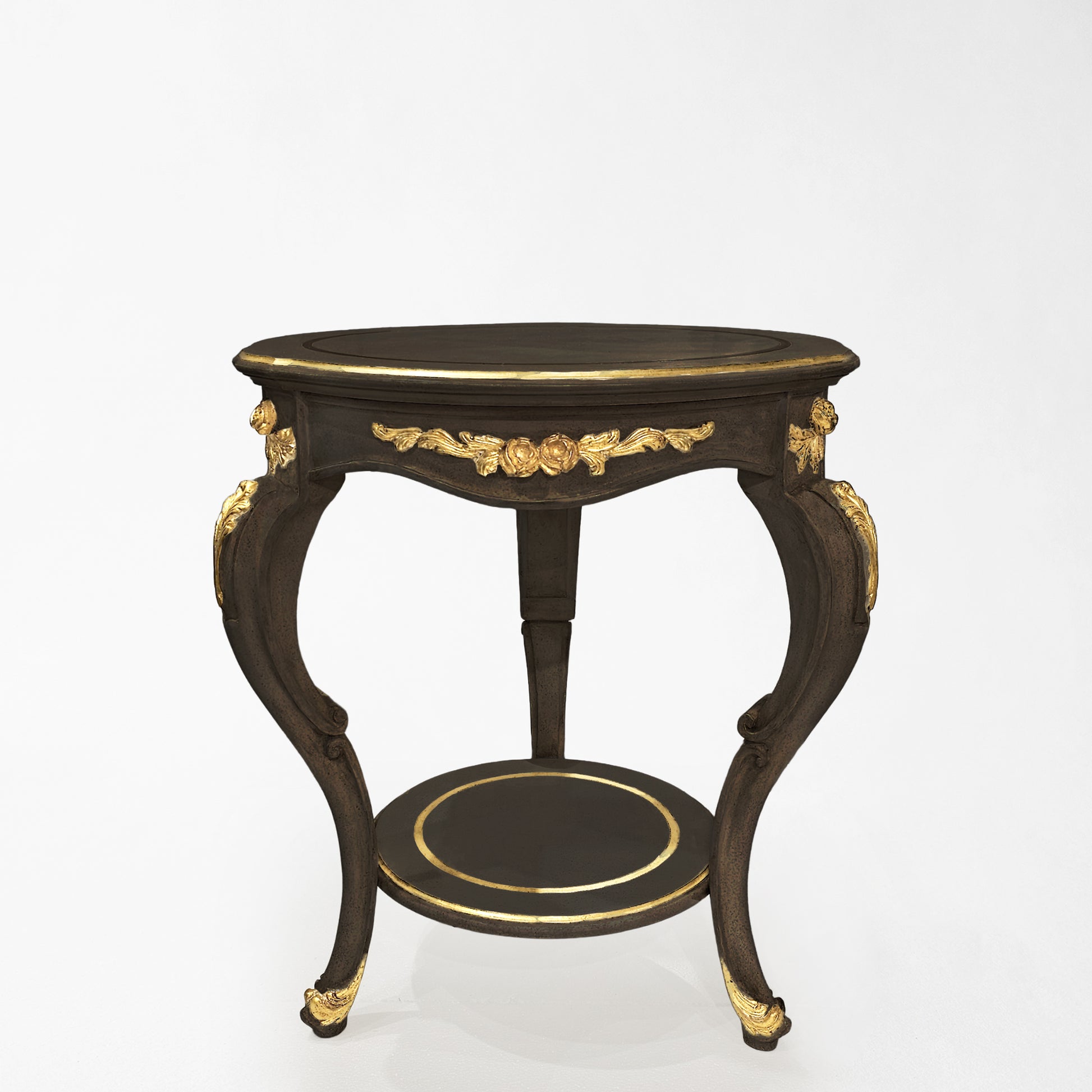Round black Italian table with intricate gold details.