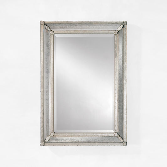 Venetian glass mirror with antiqued frame.