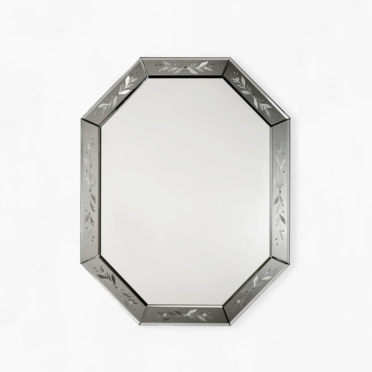 Octagonal black Venetian glass mirror.