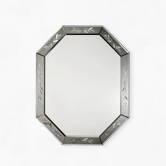 Octagonal black Venetian glass mirror.