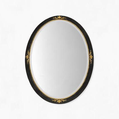 Oval black and gold Italian mirror with gold details.