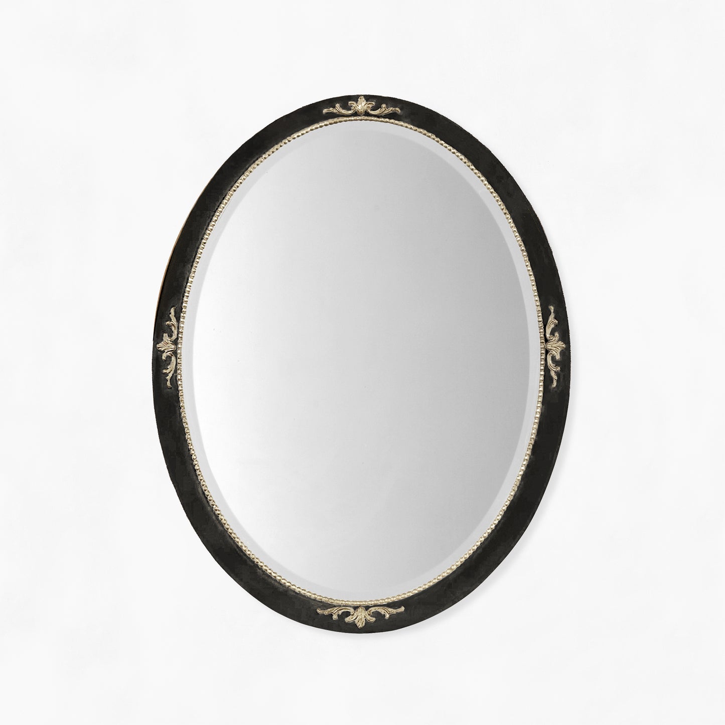 Black oval Italian mirror with silver leaf details.