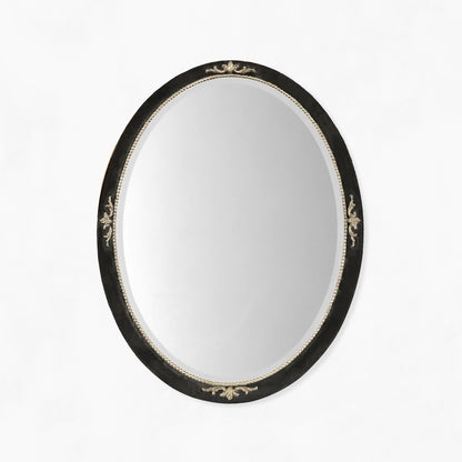 Black oval Italian mirror with silver leaf details.