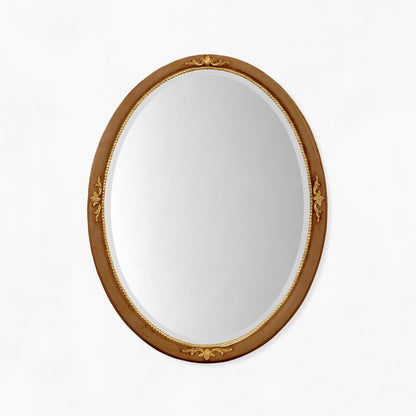 Oval brown and gold Italian mirror.