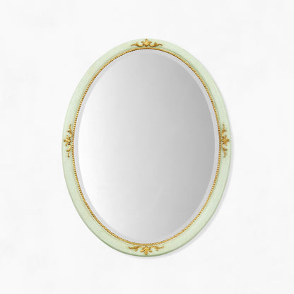 Oval green and gold Italian mirror.