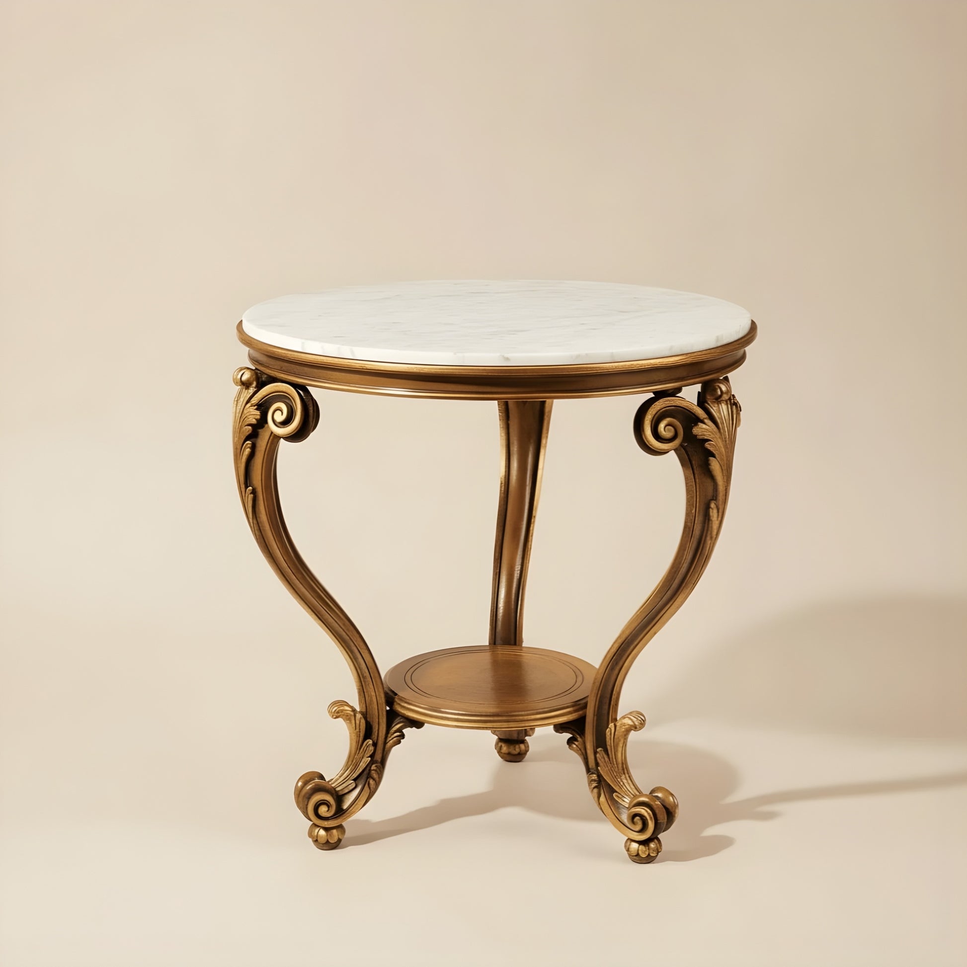 Decorative round table with marble top and gold base on a beige background