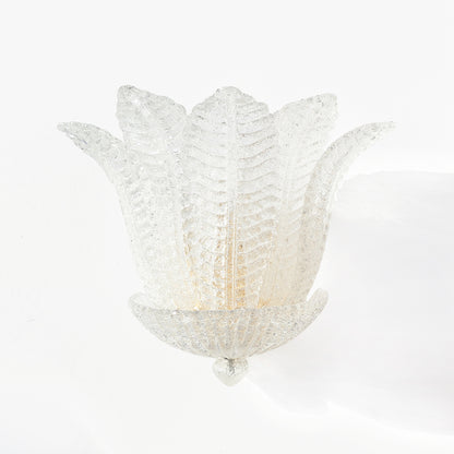 Italian luxury sconce with glass leaves.