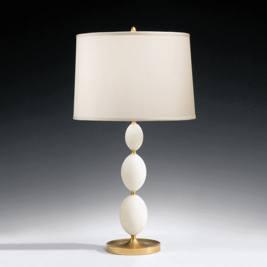 Alabaster table lamp with antique brass accent.