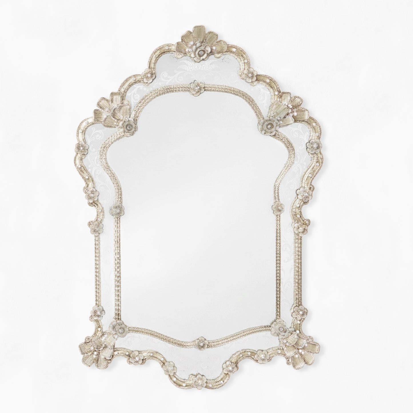 Antique Murano glass mirror with intricate details.
