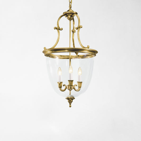 Antique brass lantern with glass.