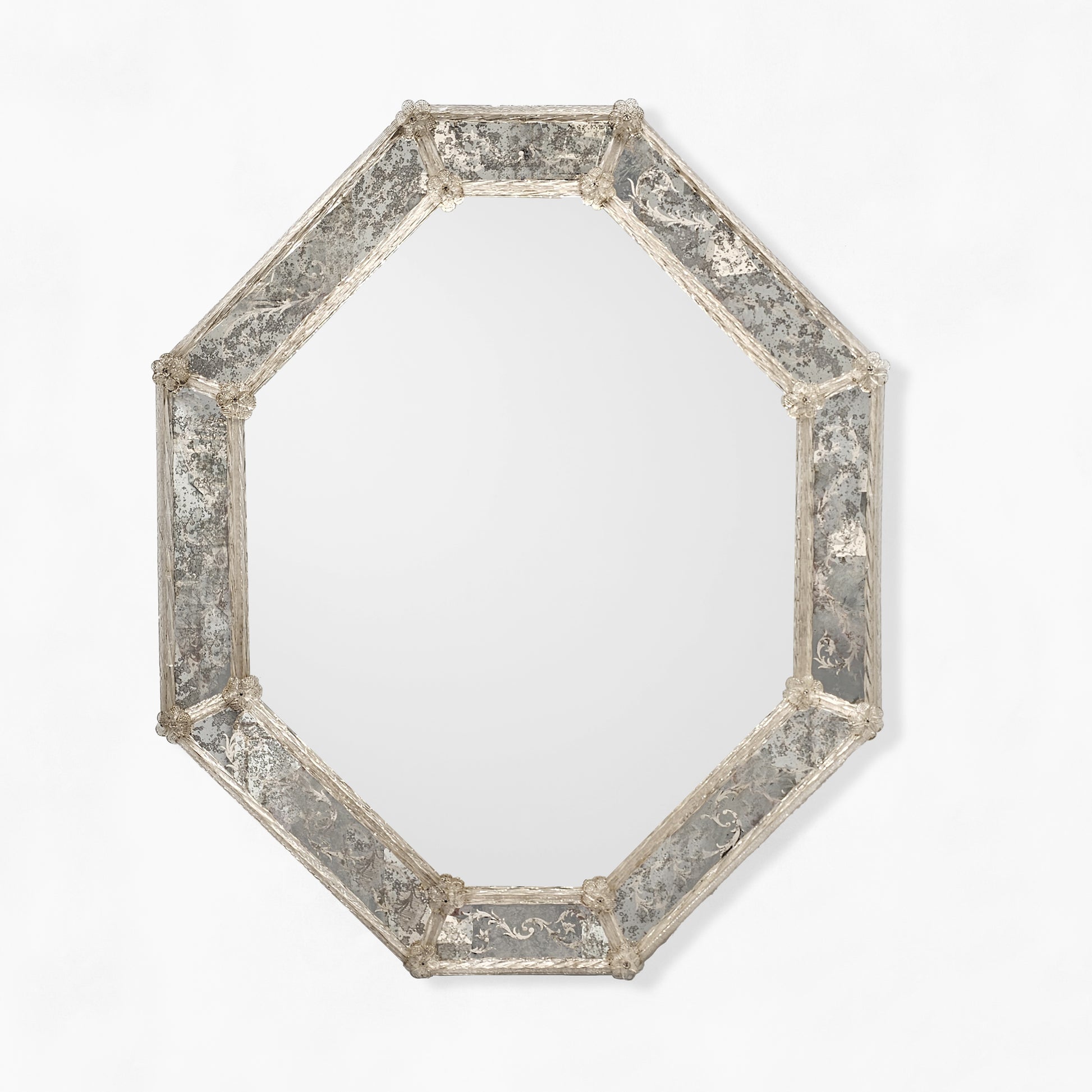 Octagonal Murano glass mirror with antique frame.