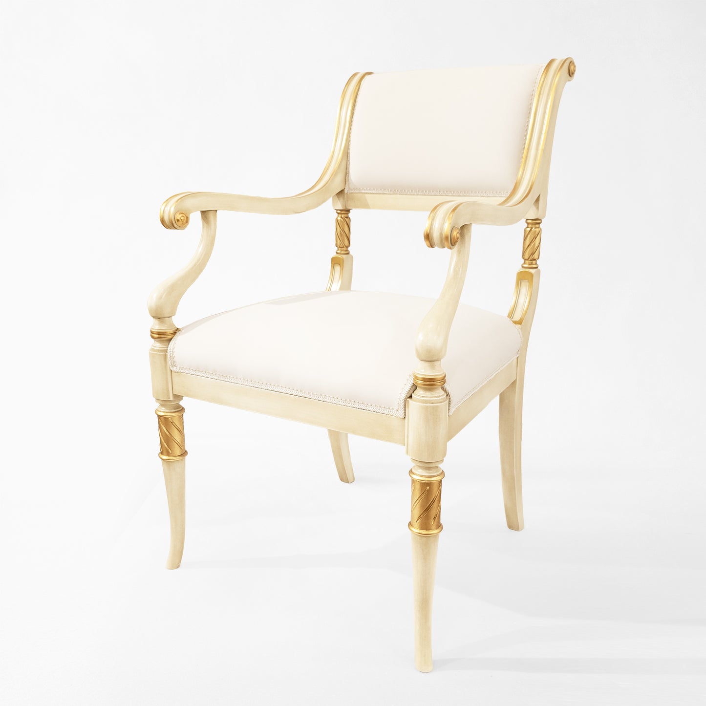 Antique white Italian chair with white fabric and carved gold details.