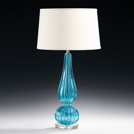 Aqua Venetian glass lamp with white shade.