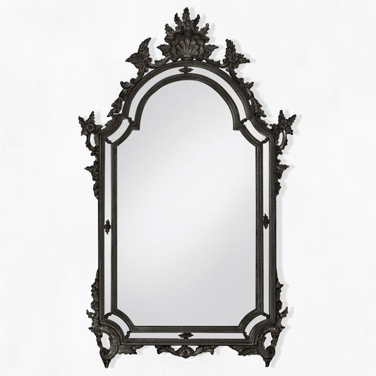 Italian black mirror with ornate details.