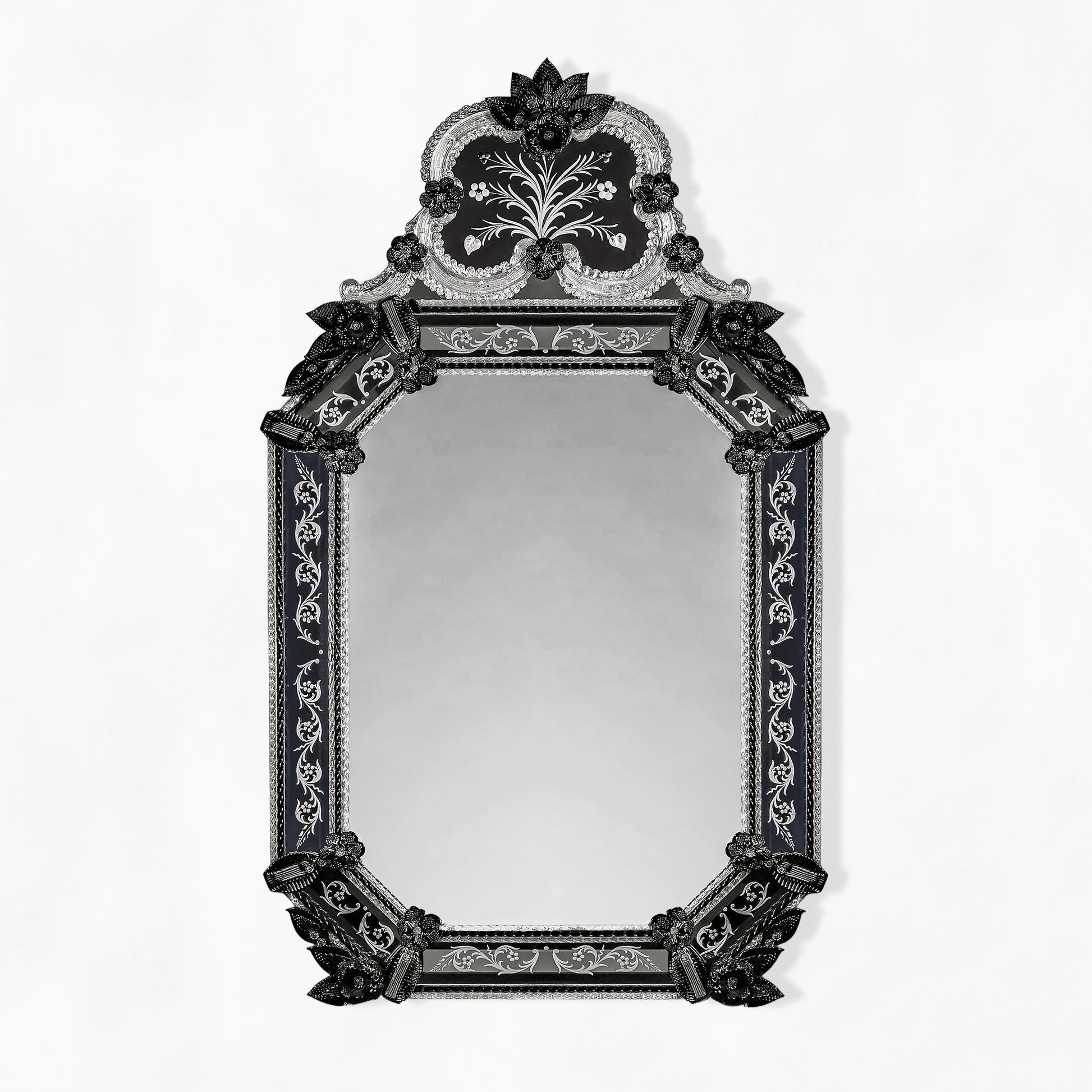 Ornate black Murano glass mirror with etched details.