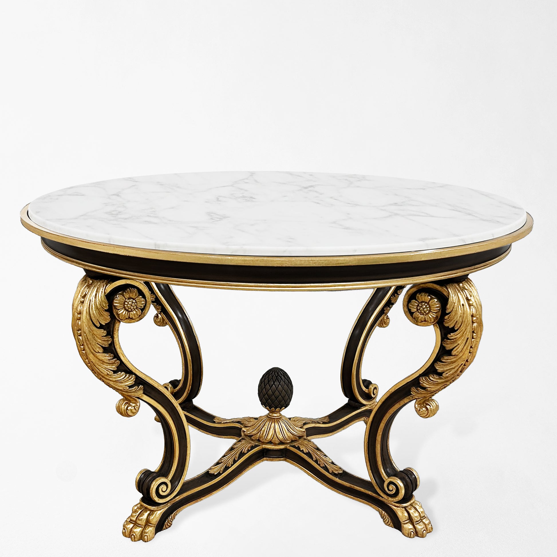 Decorative center table with marble top and gold and black base.