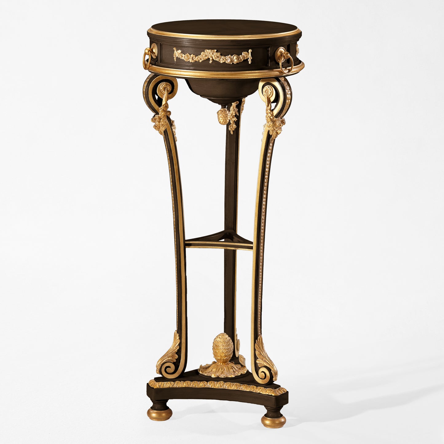 Decorative black wooden pedestal with intricate gold carved details.