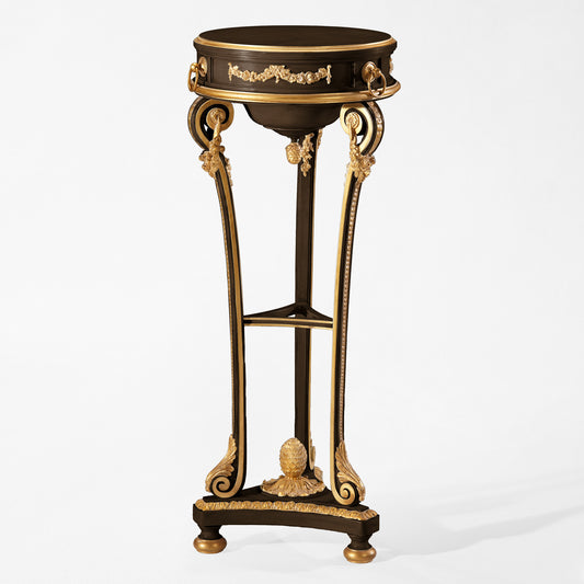 Decorative black wooden pedestal with intricate gold carved details.