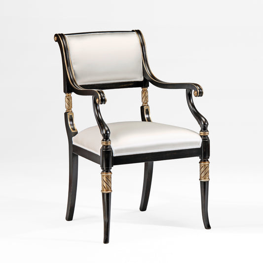 Black wood armchair with white fabric and silver leaf trim.