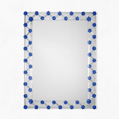 Murano glass mirror with blue floral accents.