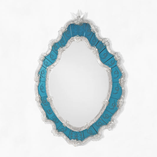 Blue Murano glass mirror with clear border.