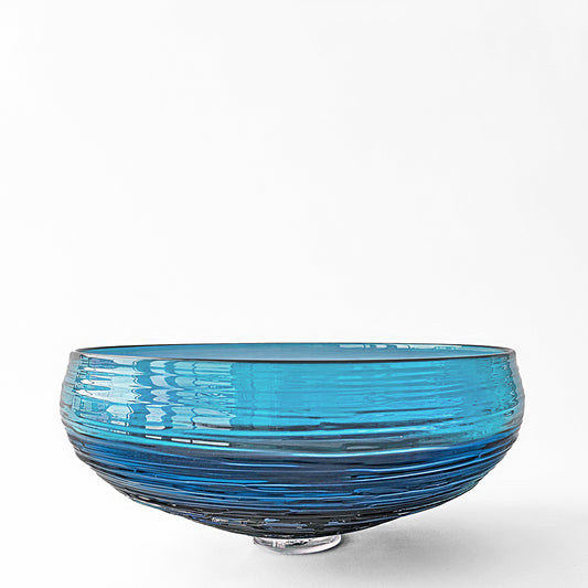 Aqua glass decorative bowl with ribbed design.