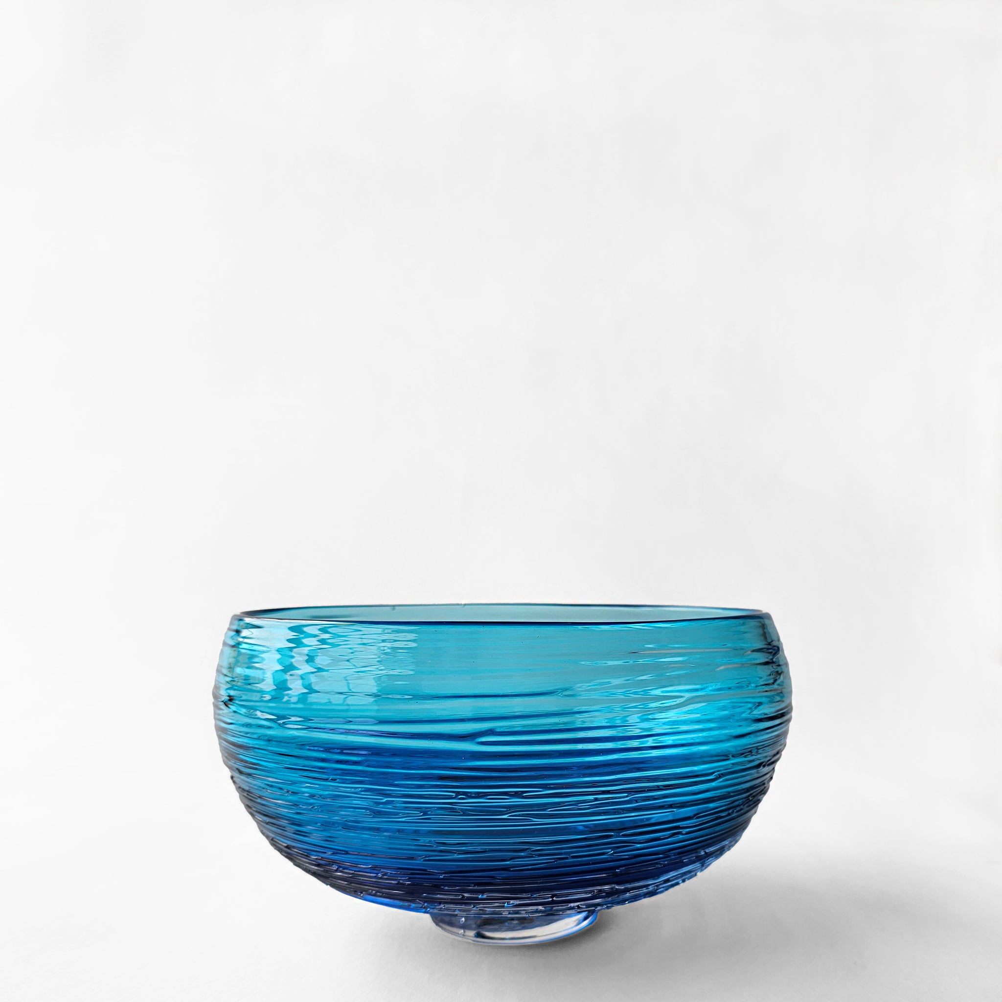 blue-glass-bowl_7f551c27-eddb-
