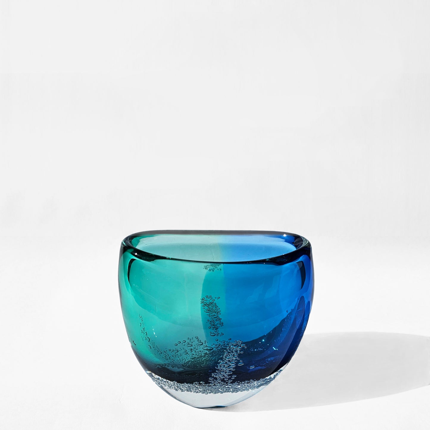 Aqua and blue glass decorative bowl.