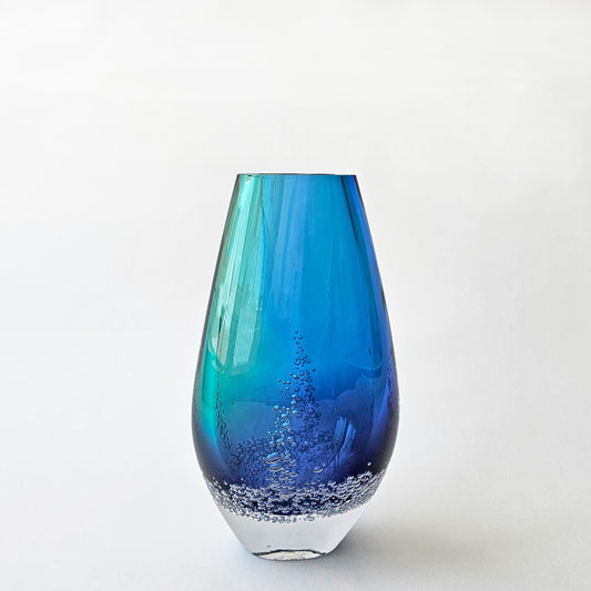 Aqua and blue glass vase with bubble design..