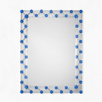 Murano glass mirror with blue floral accents.