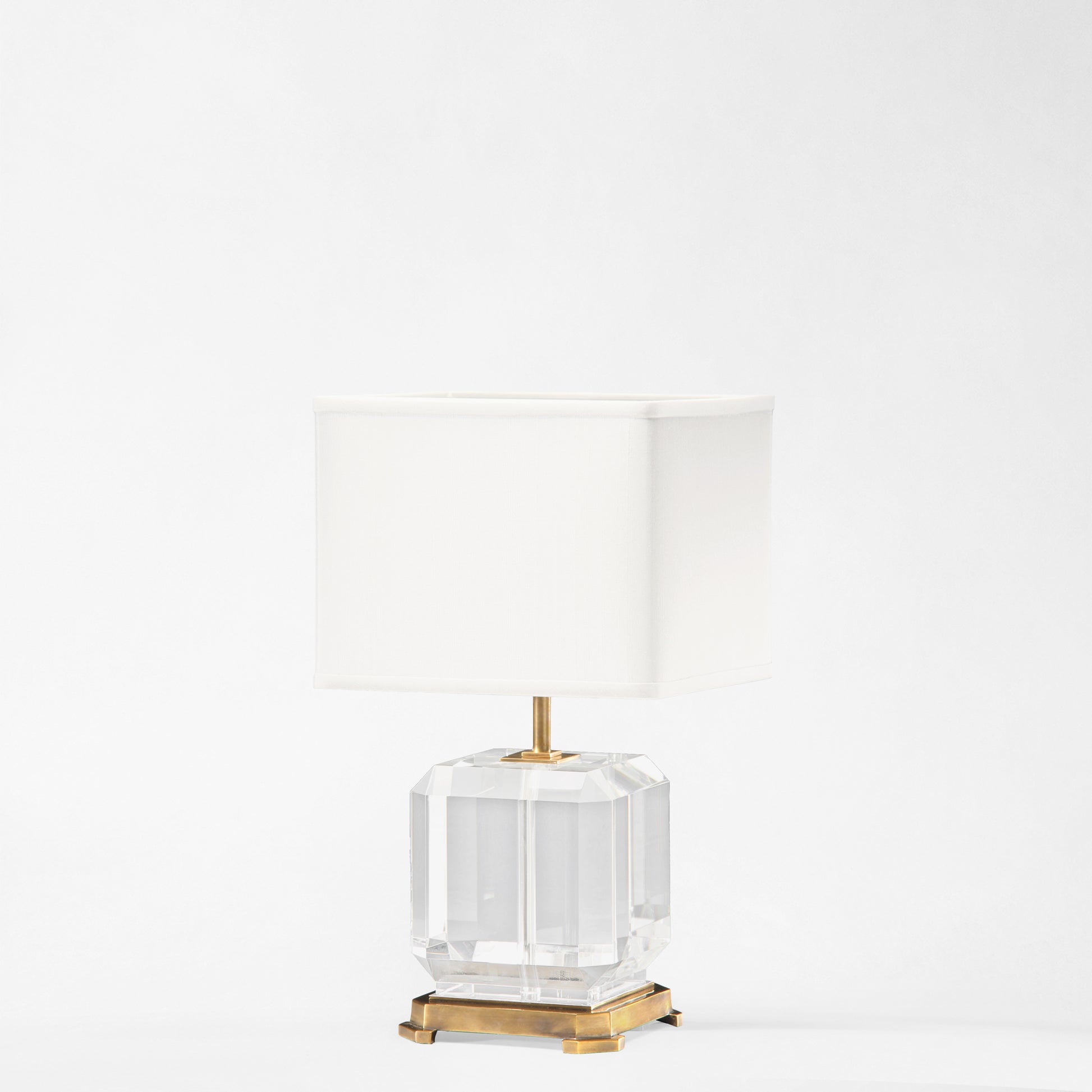 Antique brass and crystal table lamp.