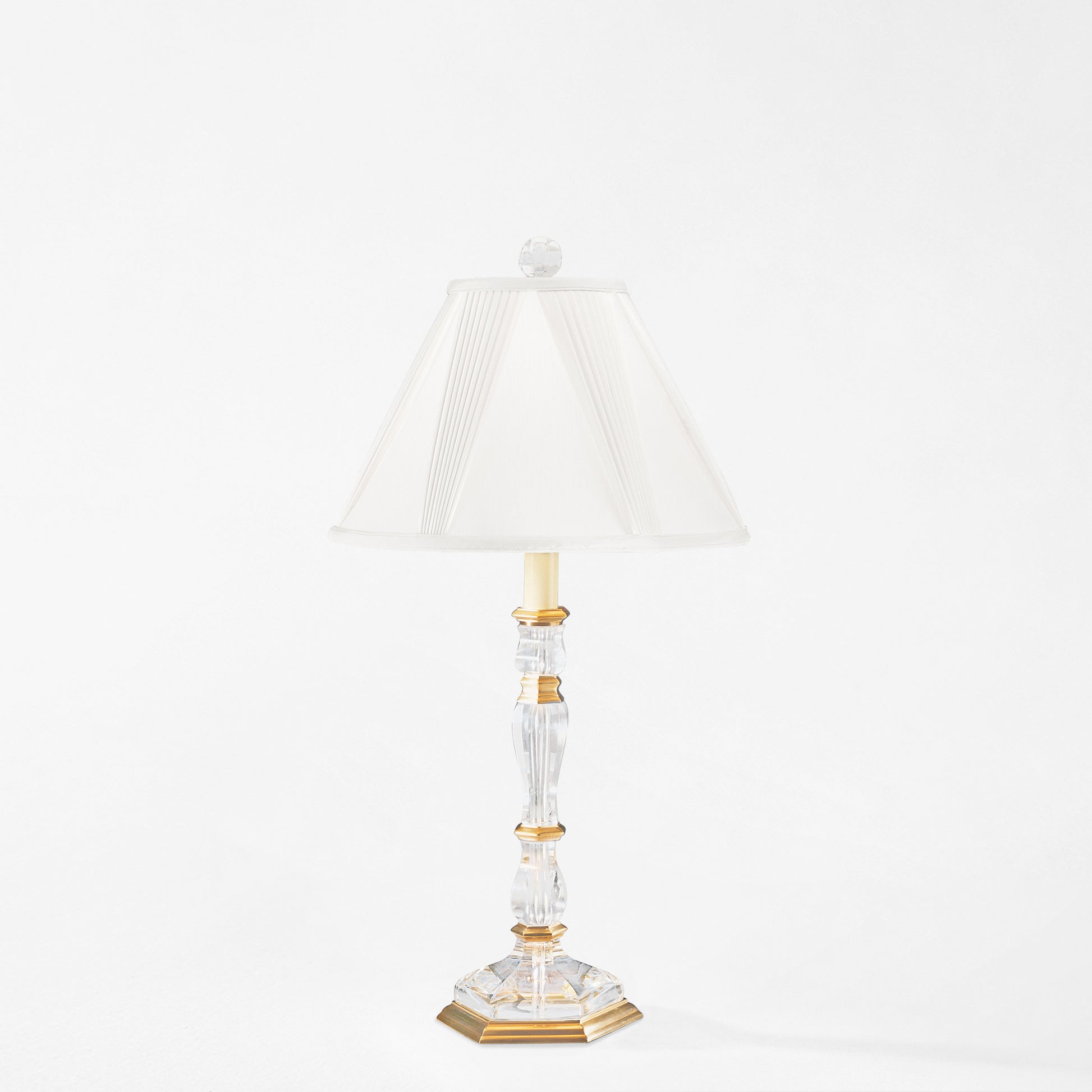 Antique brass and crystal table lamp.