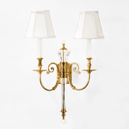 Crystal and antique brass sconce.