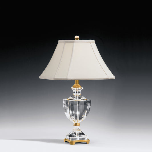 Crystal table lamp with antique brass accents and traditional shade.