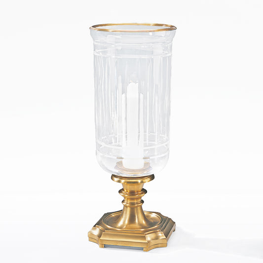 Antique brass hurricane lamp.